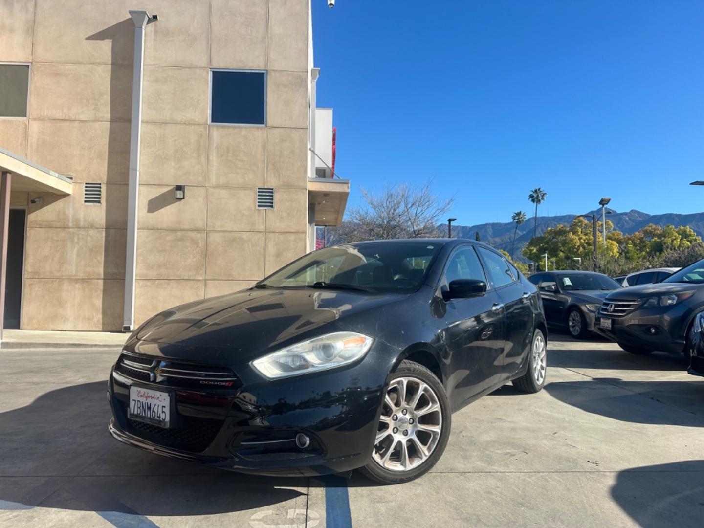 2013 Black Metallic /BLACK Dodge Dart LIMITED (1C3CDFCH4DD) with an 1.4L L4 DOHC 16V TURBO engine, 5-Speed Automatic transmission, located at 30 S. Berkeley Avenue, Pasadena, CA, 91107, (626) 248-7567, 34.145447, -118.109398 - Drive Easy with the 2013 Dodge Dart Limited: Affordable Luxury for Pasadena, Altadena, and Glendale Drivers Are you on the hunt for a reliable, stylish, and budget-friendly ride in Pasadena, Altadena, or Glendale, CA? Look no further than the 2013 Dodge Dart Limited, a sleek and sophisticated sed - Photo#0